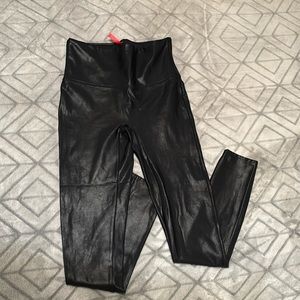 Faux leather leggings by Spanx. Size Medium Petite.